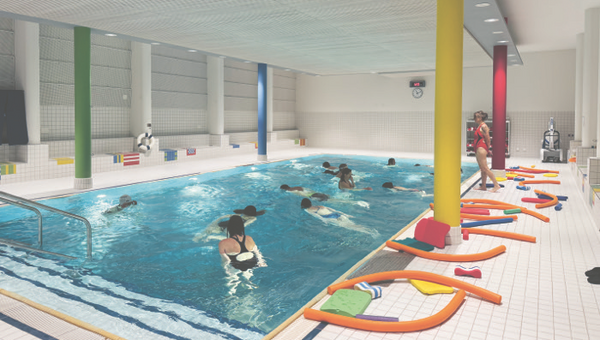 Menschen in einem Schwimmbecken im Hallenbad
